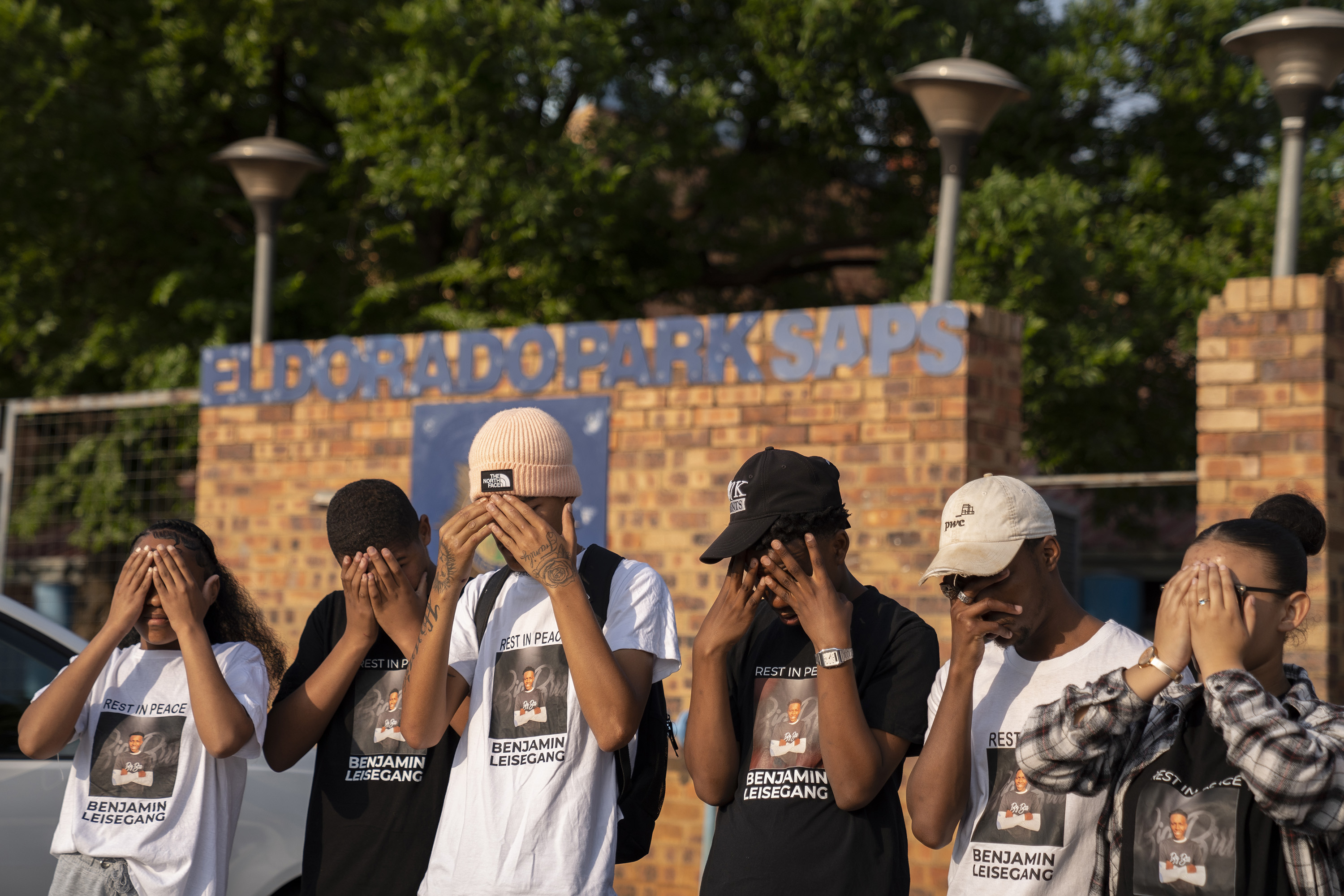 Protesters camp outside Soweto police station after a surge in gun